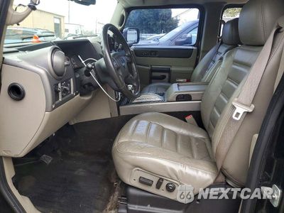 Zdjęcie 7 z 13 samochodu: 2004 HUMMER H2 VIN:5GRGN23U24H100200 - miniatura