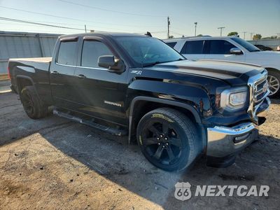 Czwarte zdjęcie samochodu z boku: 2018 GMC SIERRA K1500 SLE VIN:1GTV2MEC6JZ253282 - miniatura