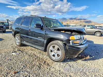 Czwarte zdjęcie samochodu z boku: 2005 GMC YUKON DENALI VIN:1GKEK63U55J201996 - miniatura