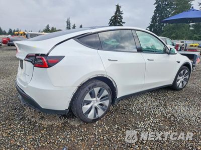 Trzecie zdjęcie samochodu z tyłu: 2021 TESLA MODEL Y VIN:5YJYGDEE6MF094287 - miniatura