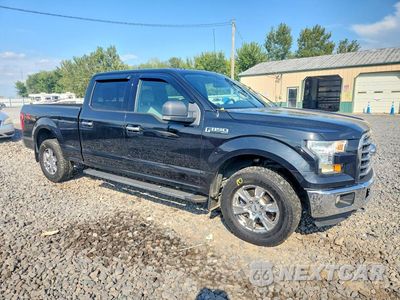 Czwarte zdjęcie samochodu z boku: 2015 FORD F150 SUPERCREW VIN:1FTFW1EF6FFB43701 - miniatura