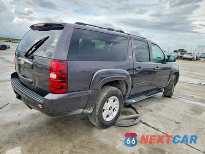 Trzecie zdjęcie samochodu z tyłu: 2011 CHEVROLET SUBURBAN K1500 LT VIN:1GNSKJE38BR278503 - miniatura