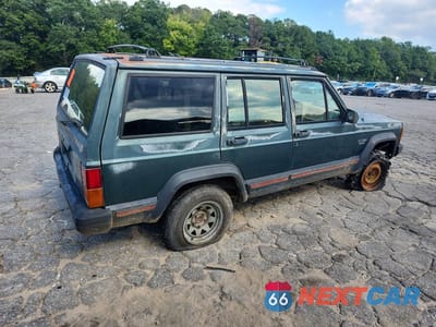 Trzecie zdjęcie samochodu z tyłu: 1994 JEEP CHEROKEE SPORT VIN:1J4FJ68SXRL148162 - miniatura