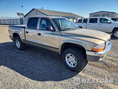 Czwarte zdjęcie samochodu z boku: 2004 DODGE DAKOTA QUAD SLT VIN:1D7HG48N74S507709 - miniatura