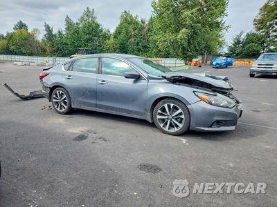 Czwarte zdjęcie samochodu z boku: 2017 NISSAN ALTIMA 2.5 SR VIN:1N4AL3AP5HC164370 - miniatura
