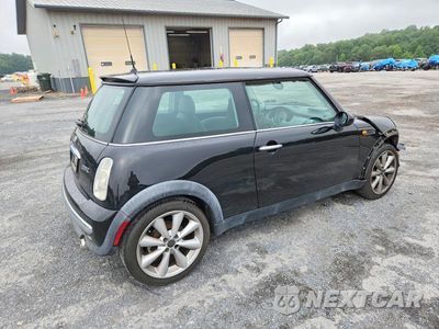 Trzecie zdjęcie samochodu z tyłu: 2002 MINI COOPER VIN:WMWRC33462TE12519 - miniatura