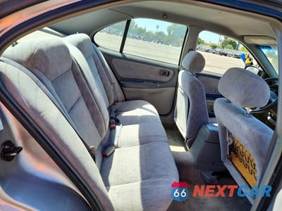 Zdjęcie 10 z 12 samochodu: 1999 NISSAN ALTIMA XE VIN:1N4DL01D0XC201440 - miniatura