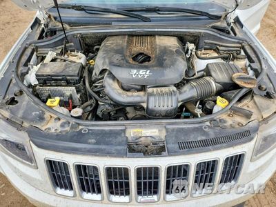 Zdjęcie 11 z 12 samochodu: 2014 JEEP GRAND CHEROKEE LAREDO VIN:1C4RJFAG7EC204836 - miniatura