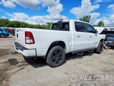 Trzecie zdjęcie samochodu z tyłu: 2020 RAM 1500 BIG HORN/LONE STAR VIN:1C6RREFG8LN148264 - miniatura