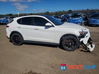 Czwarte zdjęcie samochodu z boku: 2019 ALFA ROMEO STELVIO TI VIN:ZASPAKBN1K7C30566 - miniatura