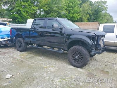 Czwarte zdjęcie samochodu z boku: 2021 FORD F250 SUPER DUTY VIN:1FT7W2B67MEE11785 - miniatura