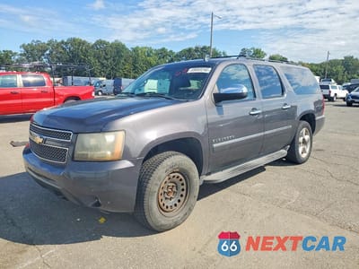 2010 CHEVROLET SUBURBAN K1500 LTZ 1GNUKKE36AR255329 - główne zdjęcie licytacji z USA - miniatura