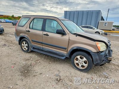 Czwarte zdjęcie samochodu z boku: 2004 HONDA CR-V LX VIN:SHSRD68404U208725 - miniatura