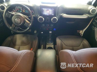 Zdjęcie 8 z 12 samochodu: 2013 JEEP WRANGLER UNLIMITED SAHARA VIN:1C4BJWEG2DL567846 - miniatura