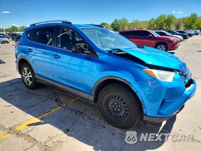Czwarte zdjęcie samochodu z boku: 2017 TOYOTA RAV4 LE VIN:JTMZFREV2HJ124145 - miniatura