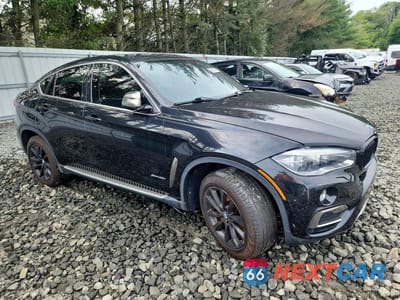 Czwarte zdjęcie samochodu z boku: 2015 BMW X6 XDRIVE35I VIN:5UXKU2C50F0F94700 - miniatura