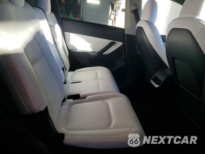 Zdjęcie 10 z 12 samochodu: 2022 TESLA MODEL Y VIN:7SAYGAEE9NF486456 - miniatura