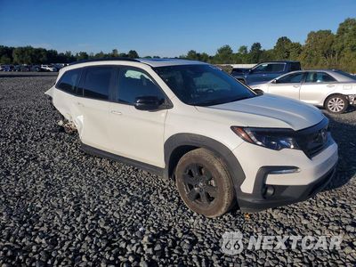 Czwarte zdjęcie samochodu z boku: 2022 HONDA PILOT TRAILSPORT VIN:5FNYF6H83NB095113 - miniatura