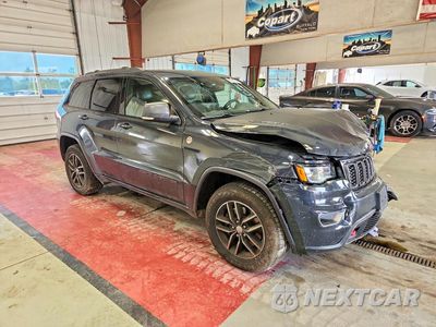 Czwarte zdjęcie samochodu z boku: 2017 JEEP GRAND CHEROKEE TRAILHAWK VIN:1C4RJFLT2HC905914 - miniatura
