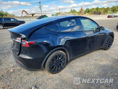 Trzecie zdjęcie samochodu z tyłu: 2023 TESLA MODEL Y VIN:7SAYGDEE7PF760225 - miniatura