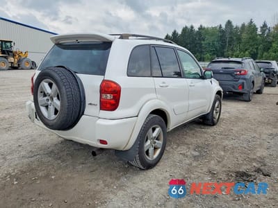 Trzecie zdjęcie samochodu z tyłu: 2004 TOYOTA RAV4 BASE VIN:JTEHD20V740036025 - miniatura