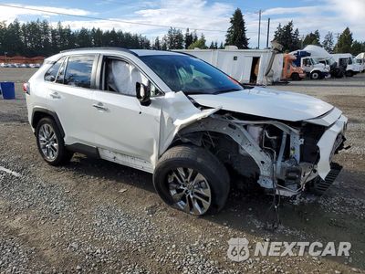 Czwarte zdjęcie samochodu z boku: 2021 TOYOTA RAV4 LIMITED VIN:JTMN1RFV5MJ040181 - miniatura