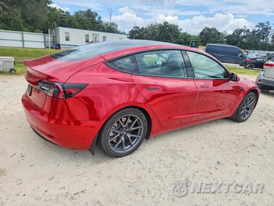 Trzecie zdjęcie samochodu z tyłu: 2023 TESLA MODEL 3 VIN:5YJ3E1EA4PF546298 - miniatura