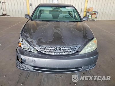 Piąte zdjęcie samochodu w środku: 2004 TOYOTA CAMRY LE VIN:4T1BE32K64U790439 - miniatura