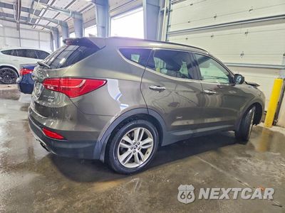 Trzecie zdjęcie samochodu z tyłu: 2014 HYUNDAI SANTA FE SPORT 2.0T VIN:5XYZWDLA1EG206978 - miniatura