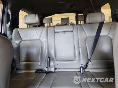 Zdjęcie 10 z 13 samochodu: 2011 HONDA PILOT TOURING VIN:5FNYF4H92BB049121 - miniatura