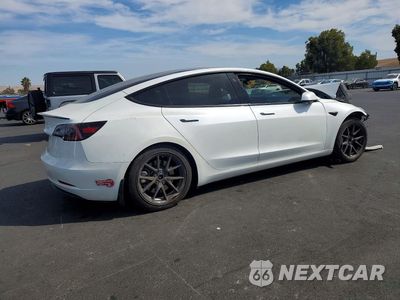 Trzecie zdjęcie samochodu z tyłu: 2023 TESLA MODEL 3 VIN:5YJ3E1EA6PF454593 - miniatura