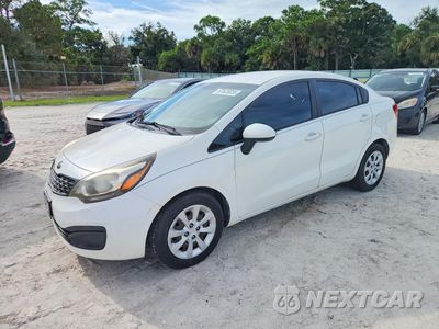 2014 KIA RIO LX KNADM4A32E6360670 - główne zdjęcie licytacji z USA - miniatura