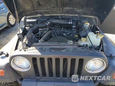Zdjęcie 12 z 13 samochodu: 1997 JEEP WRANGLER / TJ SE VIN:1J4FY29P5VP532285 - miniatura
