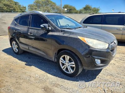Czwarte zdjęcie samochodu z boku: 2013 HYUNDAI TUCSON GLS VIN:KM8JU3AC8DU595046 - miniatura