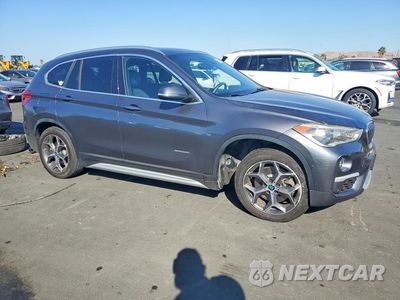 Czwarte zdjęcie samochodu z boku: 2017 BMW X1 XDRIVE28I VIN:WBXHT3Z33H4A56372 - miniatura
