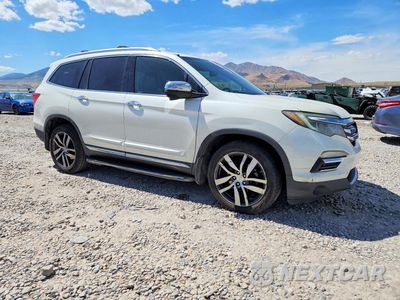 Czwarte zdjęcie samochodu z boku: 2016 HONDA PILOT TOURING VIN:5FNYF6H93GB017135 - miniatura