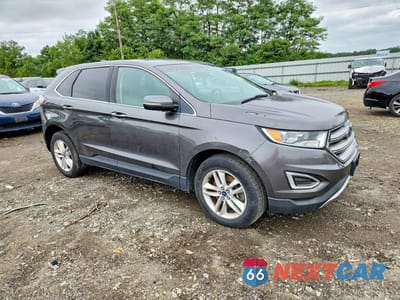 Czwarte zdjęcie samochodu z boku: 2016 FORD EDGE SEL VIN:2FMPK4J91GBB04398 - miniatura