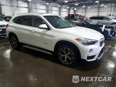 Czwarte zdjęcie samochodu z boku: 2018 BMW X1 XDRIVE28I VIN:WBXHT3C31J5K21230 - miniatura