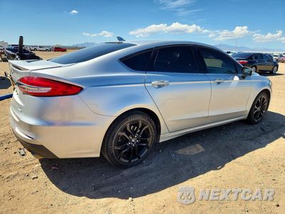 Trzecie zdjęcie samochodu z tyłu: 2019 FORD FUSION SE VIN:3FA6P0HD4KR115013 - miniatura