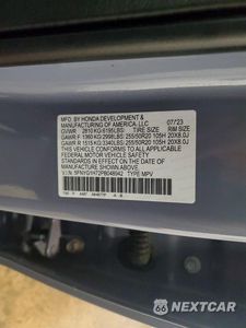 Zdjęcie 14 z 14 samochodu: 2023 HONDA PILOT TOURING VIN:5FNYG1H72PB048942 - miniatura