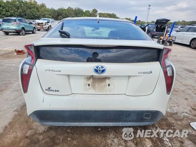 Zdjęcie 6 z 13 samochodu: 2017 TOYOTA PRIUS TWO VIN:JTDKBRFU3H3028077 - miniatura