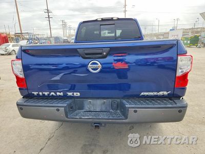 Zdjęcie 6 z 12 samochodu: 2016 NISSAN TITAN XD PRO-4X VIN:1N6BA1F40GN505973 - miniatura