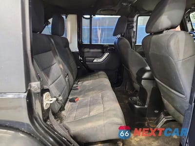 Zdjęcie 10 z 12 samochodu: 2012 JEEP WRANGLER UNLIMITED SAHARA VIN:1C4BJWEG9CL134538 - miniatura