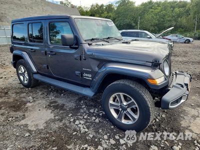 Czwarte zdjęcie samochodu z boku: 2020 JEEP WRANGLER UNLIMITED SAHARA VIN:1C4HJXEN7LW164909 - miniatura