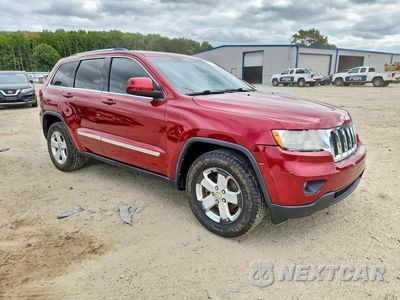 Czwarte zdjęcie samochodu z boku: 2013 JEEP GRAND CHEROKEE LAREDO VIN:1C4RJFAG7DC561240 - miniatura