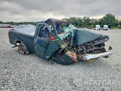 Czwarte zdjęcie samochodu z boku: 2001 FORD F150 VIN:1FTZF17211NB96800 - miniatura
