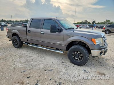 Czwarte zdjęcie samochodu z boku: 2012 FORD F150 SUPERCREW VIN:1FTFW1ET6CFB94763 - miniatura