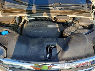 Zdjęcie 12 z 13 samochodu: 2018 HONDA PILOT EXL VIN:5FNYF5H51JB028228 - miniatura
