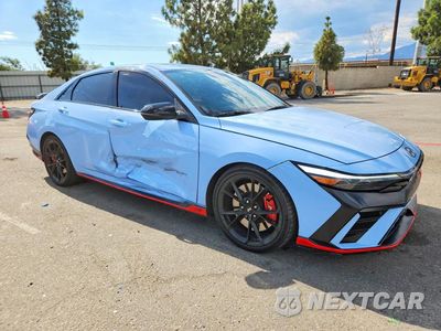 Czwarte zdjęcie samochodu z boku: 2024 HYUNDAI ELANTRA N BASE VIN:KMHLW4DK4RU021532 - miniatura