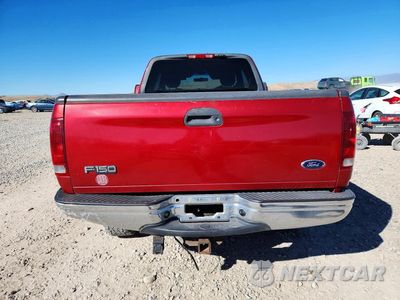 Zdjęcie 6 z 12 samochodu: 2002 FORD F150 VIN:1FTRX18L62NB00200 - miniatura